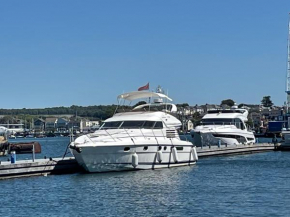 Tranquility Yachts -a 52ft Motor Yacht with waterfront views over Plymouth.